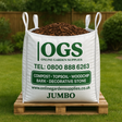 OGS Online Garden Supplies bag of Border Bark on a wooden pallet